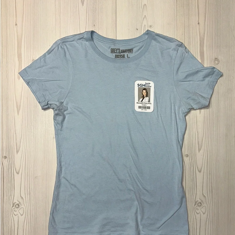 Grey's Anatomy Light Blue Women's Short Sleeve Tee - Picture 1 of 4